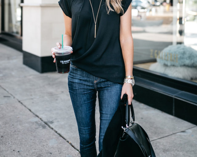 A black modcloth blouse under $40 styled with jeans and heels