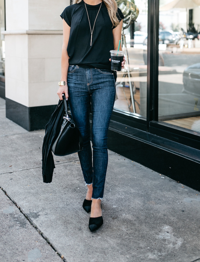 A black modcloth blouse under $40 styled with jeans and heels